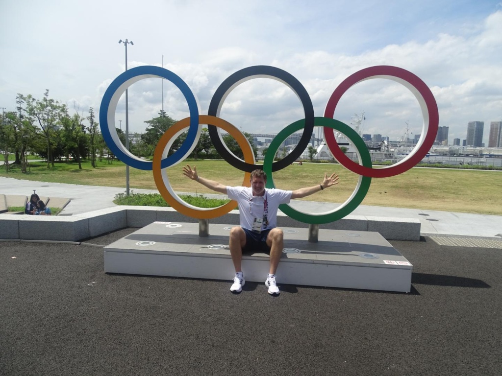 MJ in front of the Olympic Rings in Tokyo